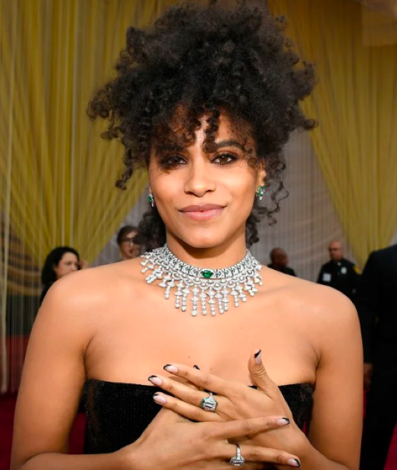 Zazie Beetz with emerald necklace